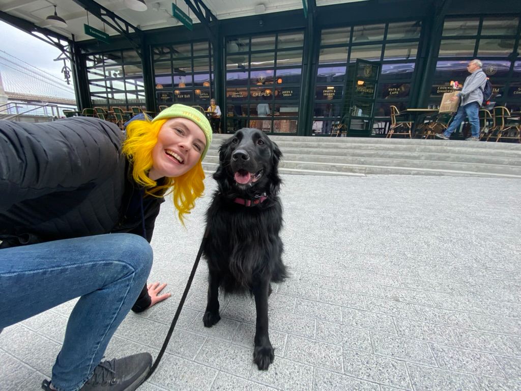 Britta with a dog at the Seaport