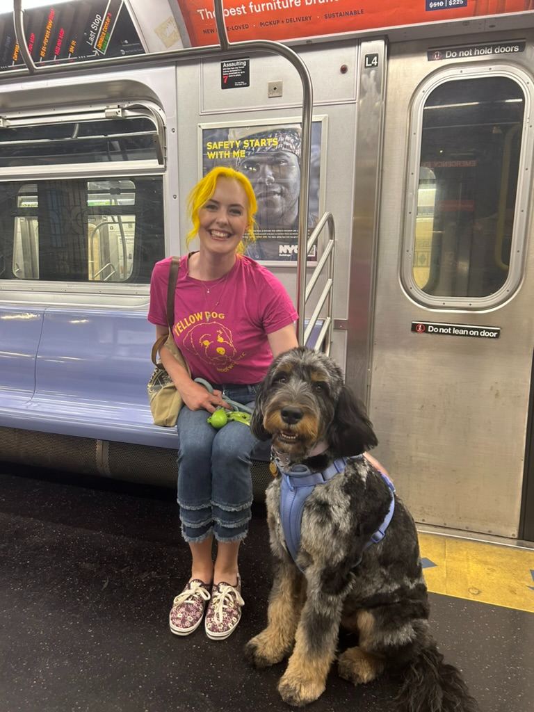 Britta and a dog on the subway